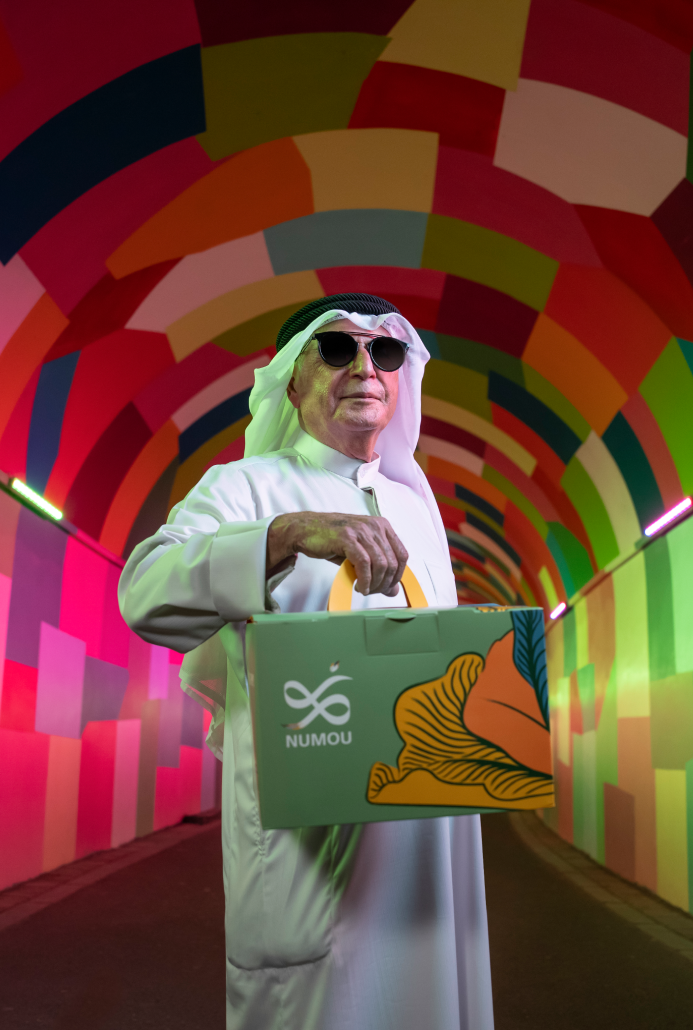 An Arabic Holding a Gift Box