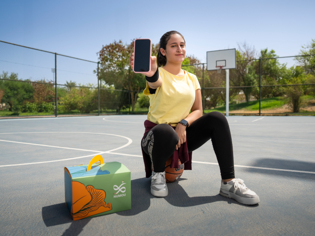 Young Girl Holding a Gift Box