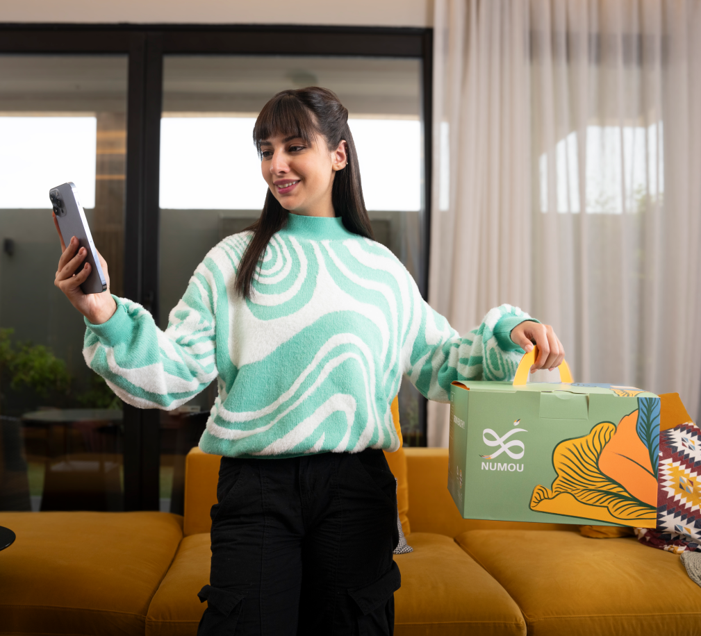 A Young Girl Holding a Gift Box